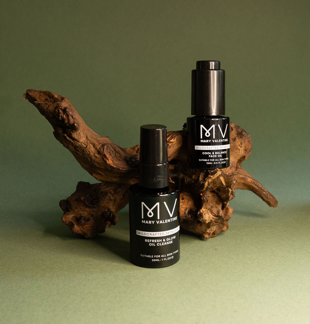 Two bottles of Mary Valentine Wildcrafted Skincare oils in a ritual duo